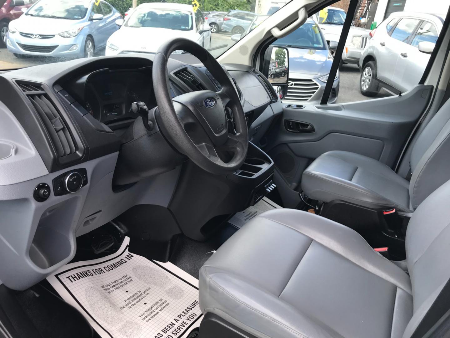 2018 White /Gray Ford Transit 150 Low Roof (1FTYE1YM7JK) with an 3.7 V6 engine, Automatic transmission, located at 577 Chester Pike, Prospect Park, PA, 19076, (610) 237-1015, 39.886154, -75.302338 - 2018 Ford Transit 150 Low Roof: Double drop down ladder racks, multiple pieces of shelving, heavy duty partition, new PA inspection, FLEET MAINTAINED, runs LIKE NEW! This vehicle comes inspected and has been given a bumper to bumper safety check. It is very clean, reliable, and well maintained. W - Photo#9